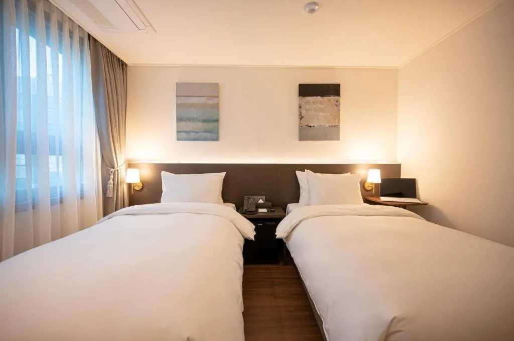 Bed in HOTEL D EDITION