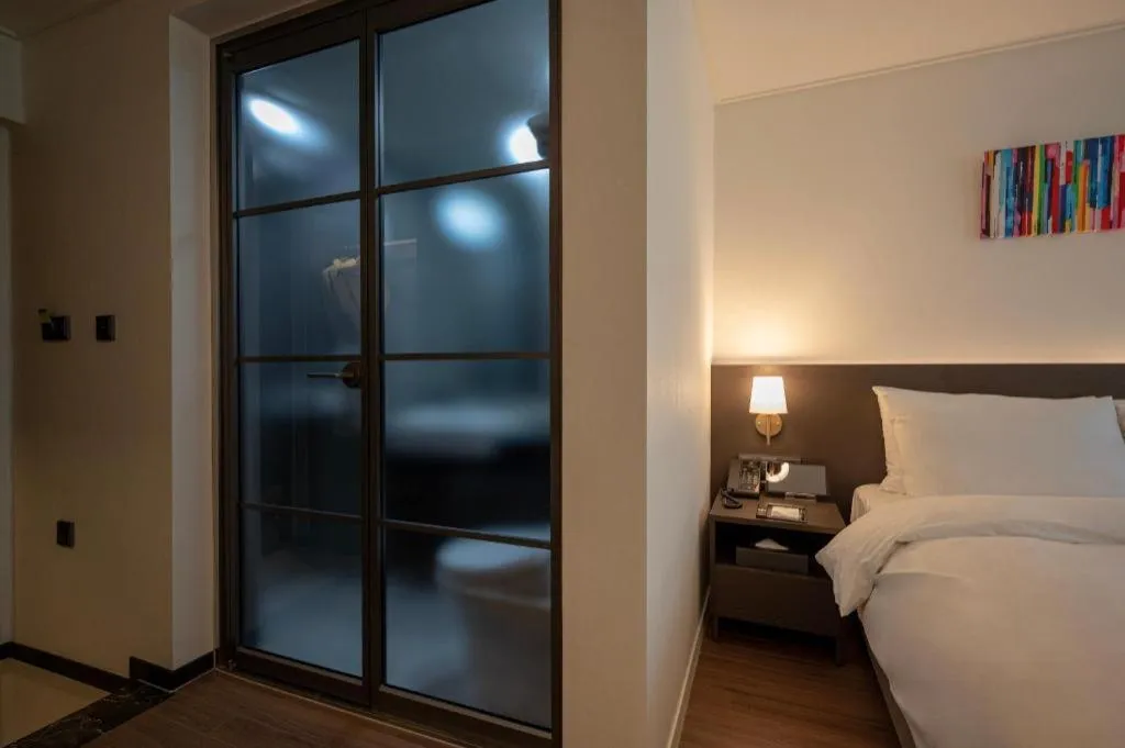 Bed in HOTEL D EDITION