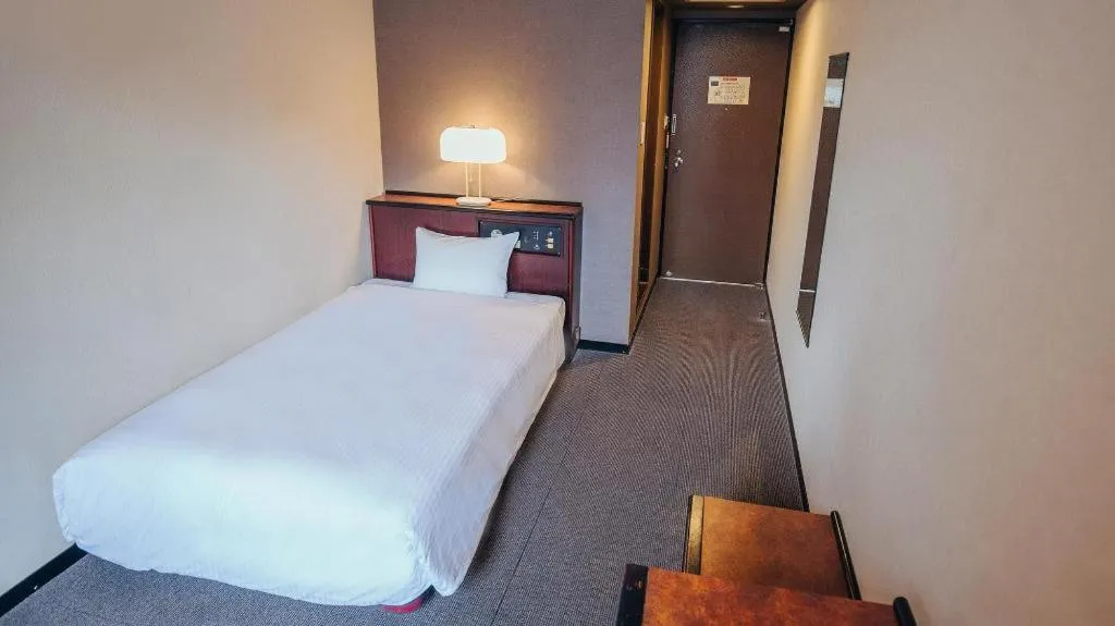 Bed in Hotel Areaone Miyazaki