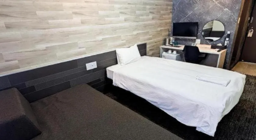 Bed in Hotel Areaone Miyazaki