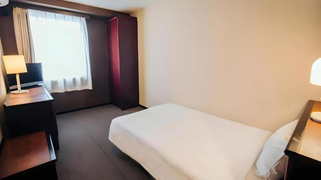 Bed in Hotel Areaone Miyazaki