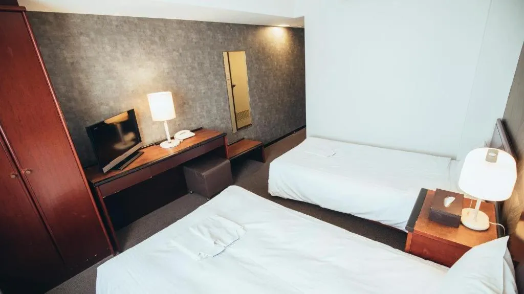 Bed in Hotel Areaone Miyazaki