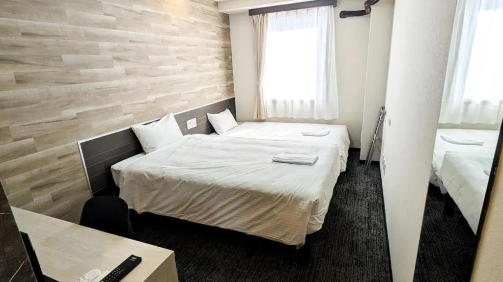 Bed in Hotel Areaone Miyazaki