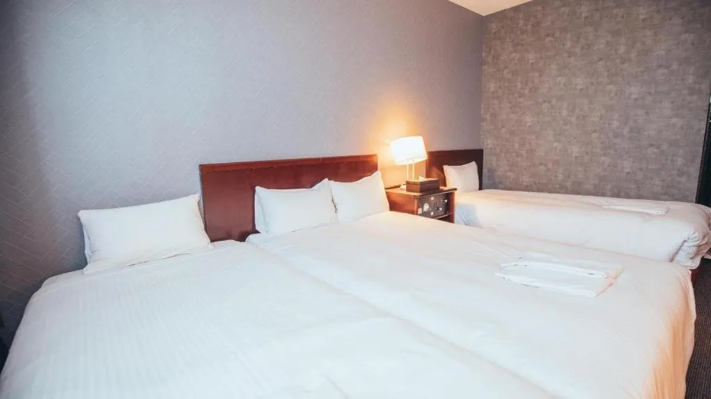 Bed in Hotel Areaone Miyazaki