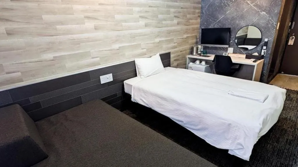 Bed in Hotel Areaone Miyazaki