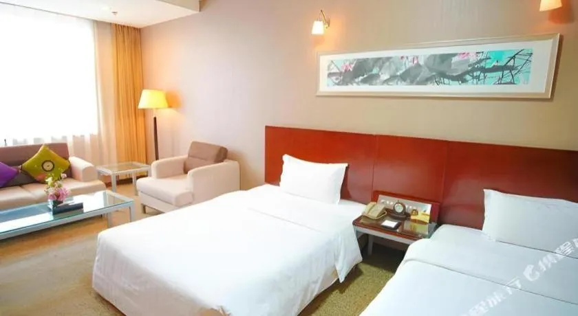 Bed in Xian Grand Soluxe International Hotel