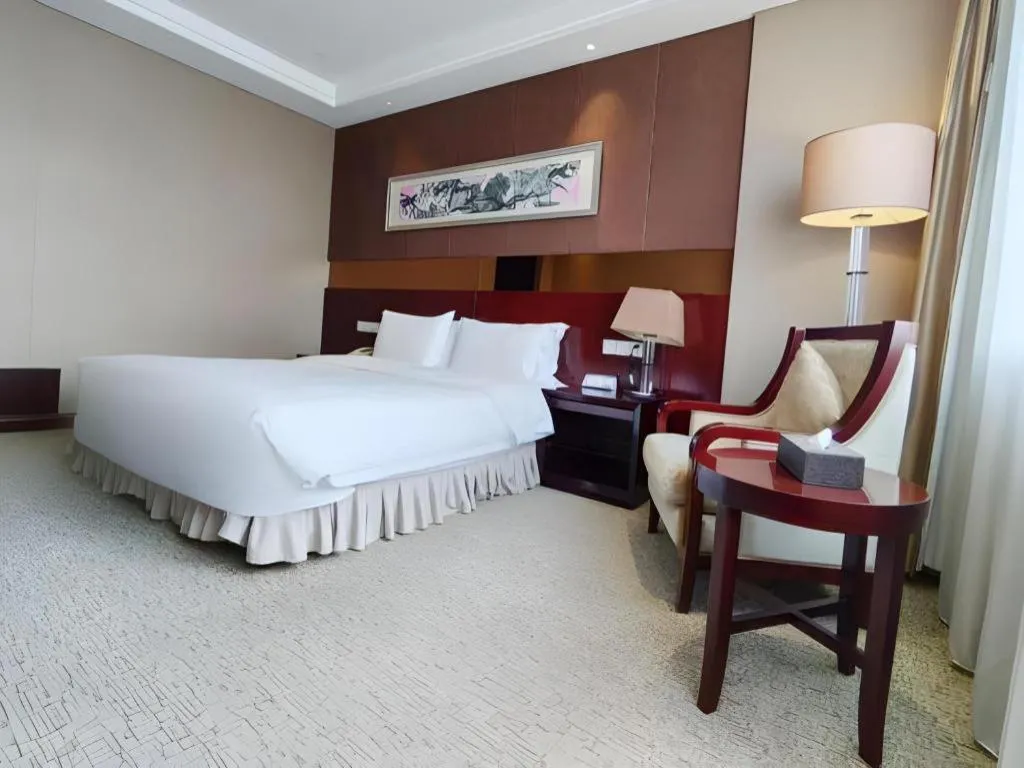 Bed in Xian Grand Soluxe International Hotel