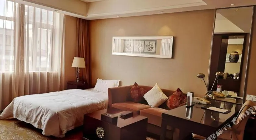 Bed in Xian Grand Soluxe International Hotel