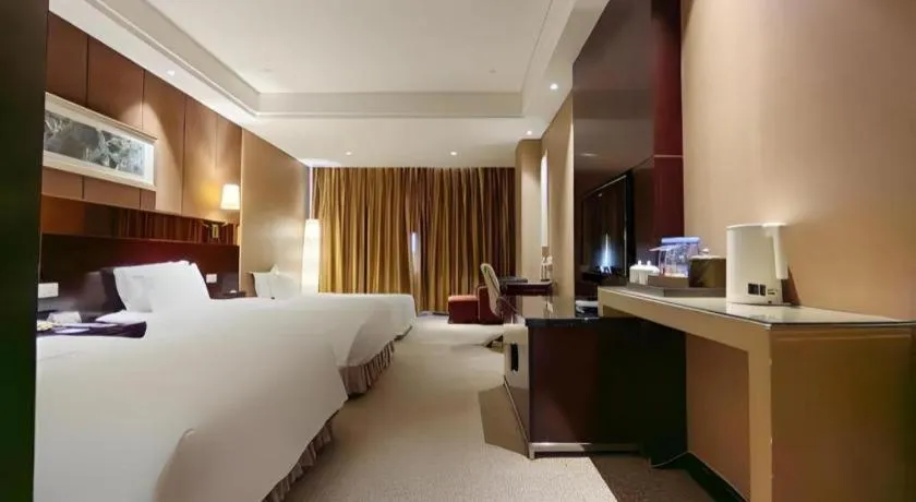 Bed in Xian Grand Soluxe International Hotel