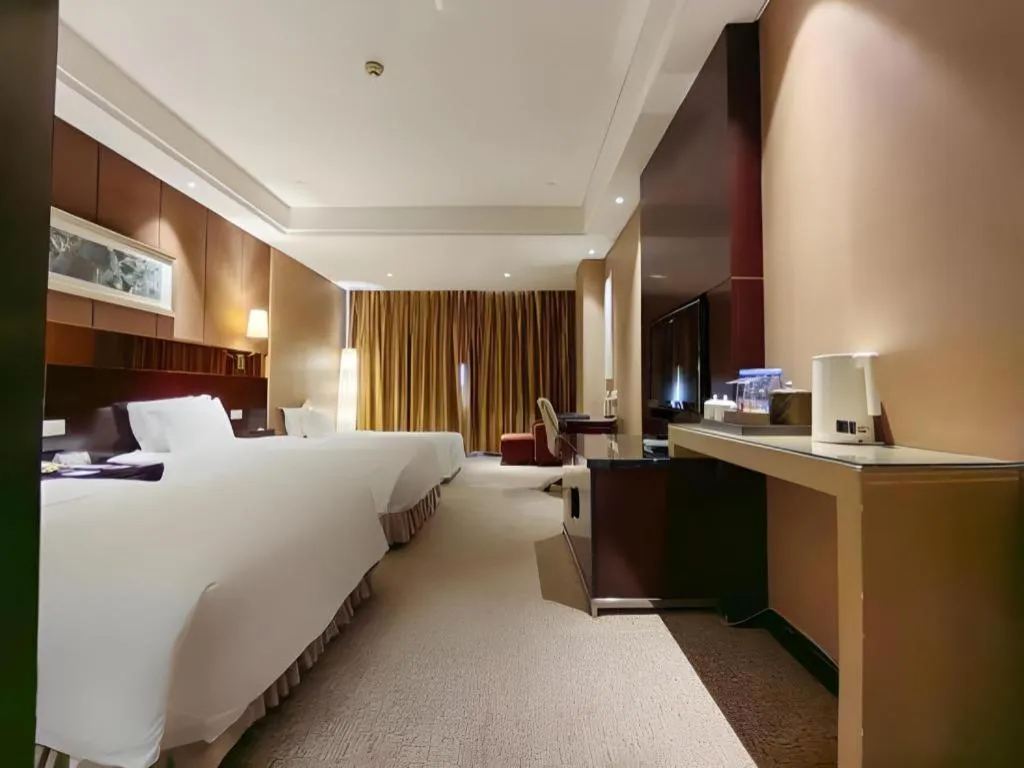 Bed in Xian Grand Soluxe International Hotel