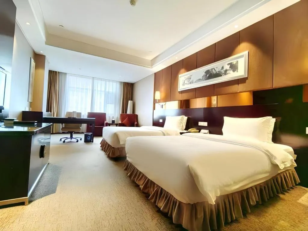 Bed in Xian Grand Soluxe International Hotel