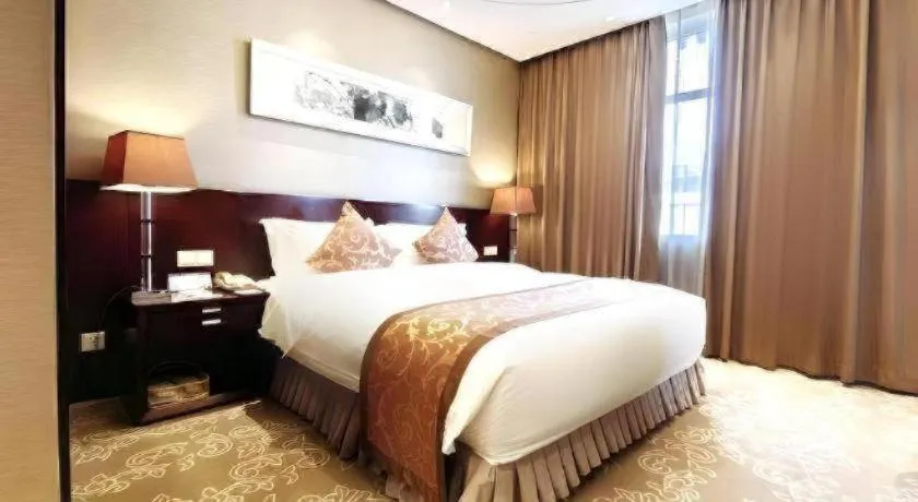Bed in Xian Grand Soluxe International Hotel