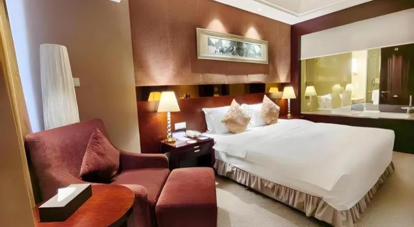 Bed in Xian Grand Soluxe International Hotel