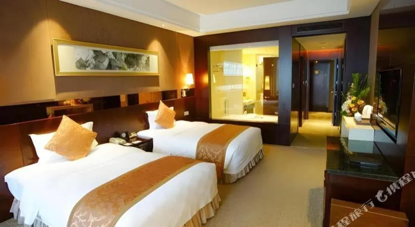 Bed in Xian Grand Soluxe International Hotel