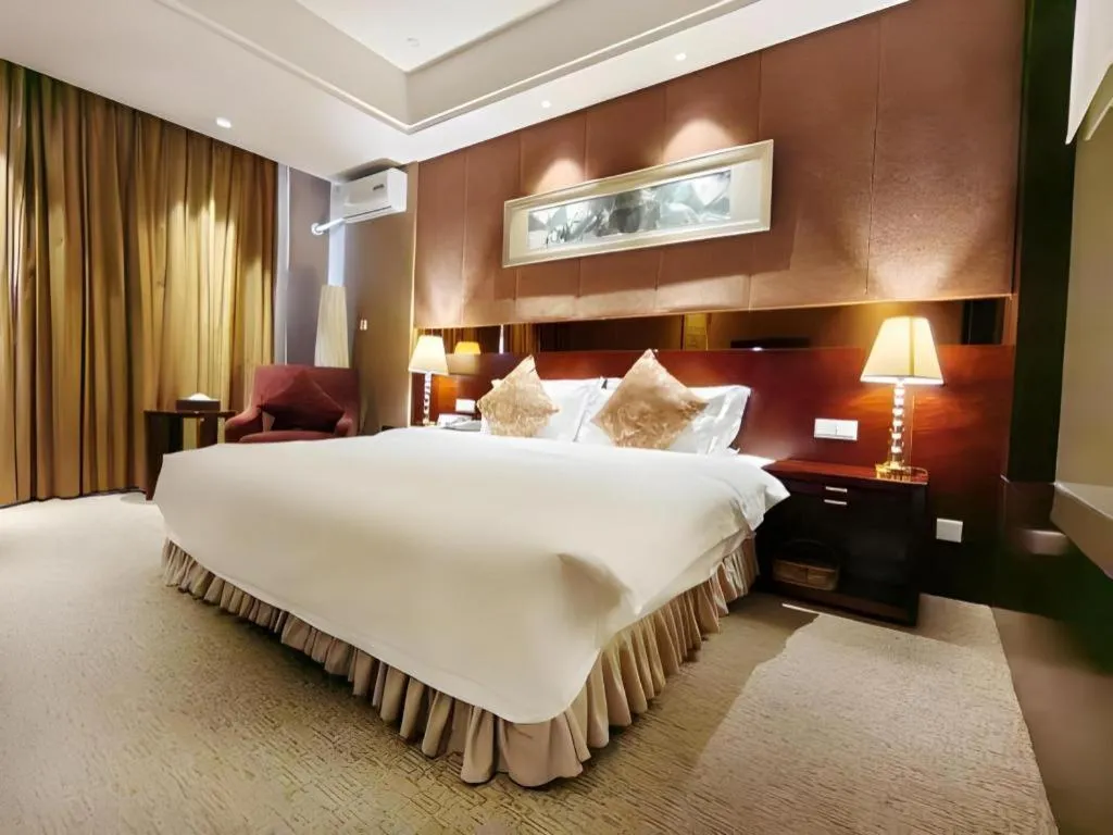 Bed in Xian Grand Soluxe International Hotel