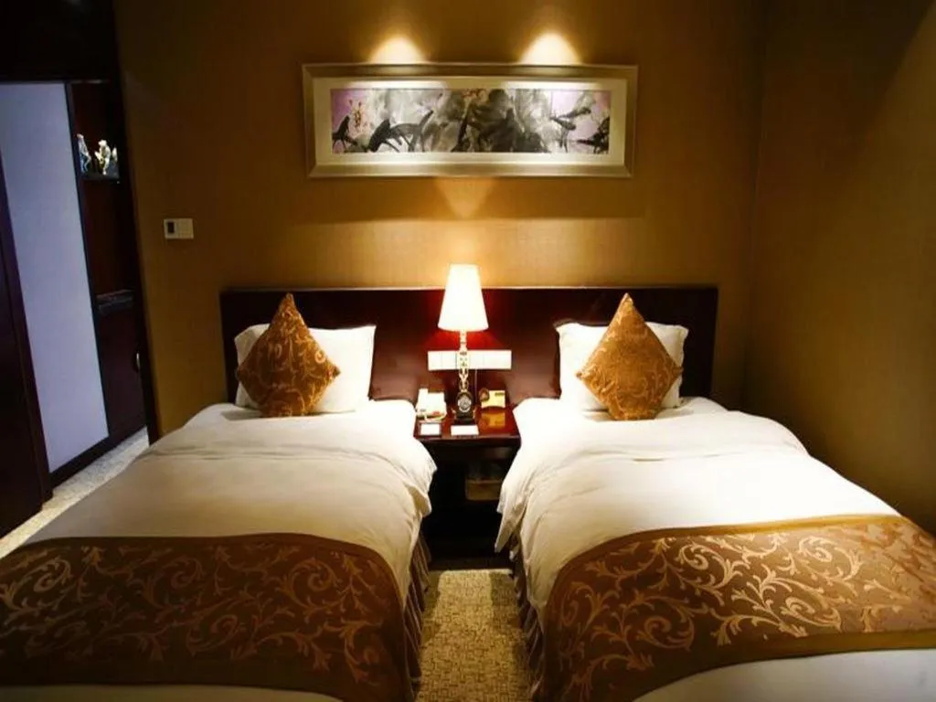 Bed in Xian Grand Soluxe International Hotel