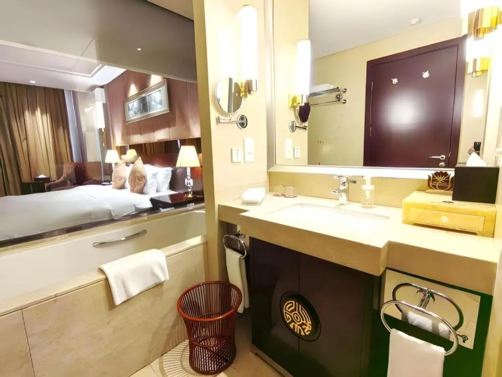 Bed in Xian Grand Soluxe International Hotel