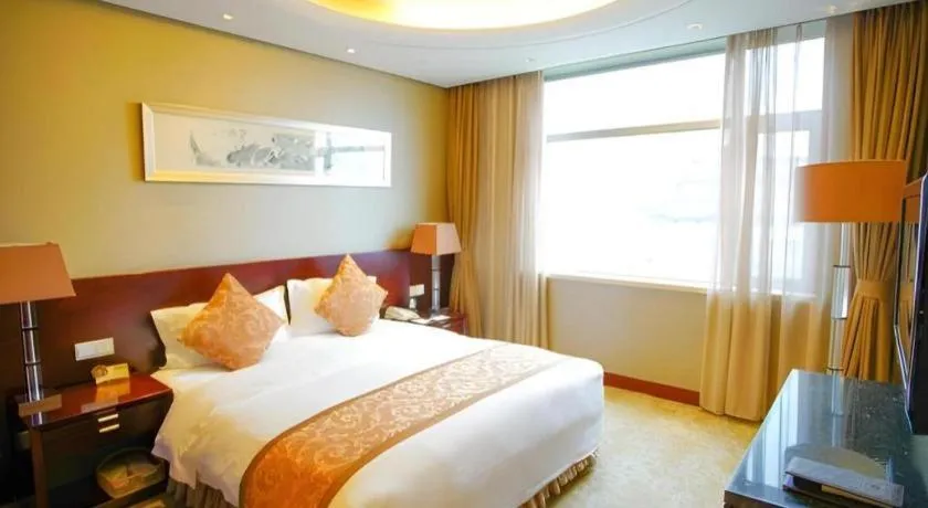 Bed in Xian Grand Soluxe International Hotel
