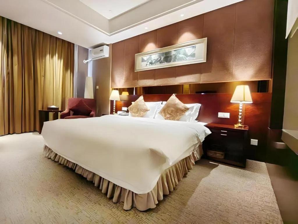 Bed in Xian Grand Soluxe International Hotel