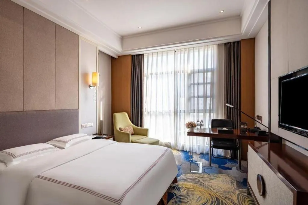 Bed in Shanghai Manhattan Hotel Minhang