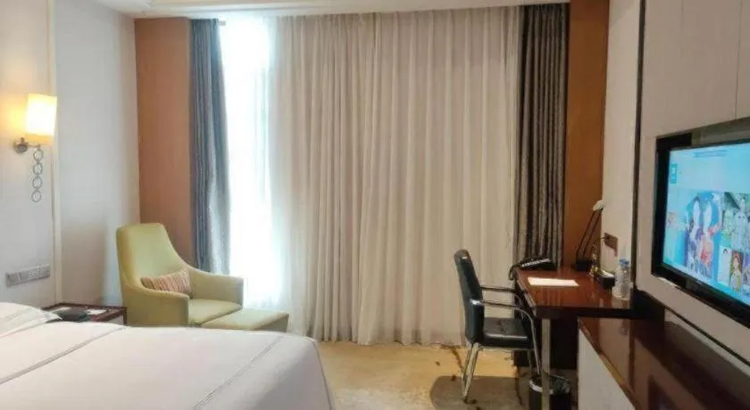 Bed in Shanghai Manhattan Hotel Minhang