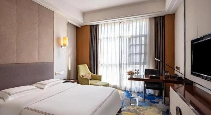 Bed in Shanghai Manhattan Hotel Minhang