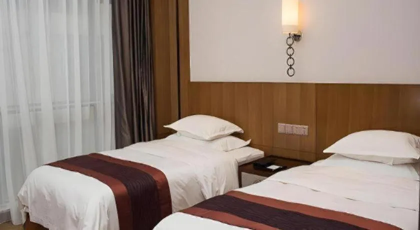 Bed in Shanghai Manhattan Hotel Minhang