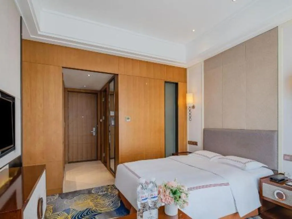 Bed in Shanghai Manhattan Hotel Minhang
