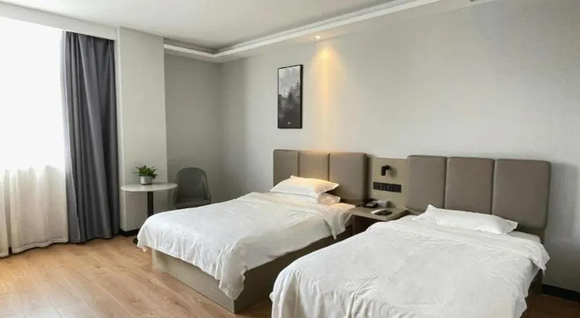 Bed in GreenTree Inn Hefei East Wangjiang Road CTCE Express Hotel