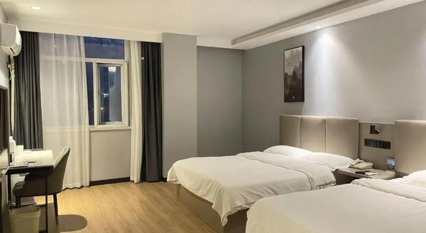 Bed in GreenTree Inn Hefei East Wangjiang Road CTCE Express Hotel