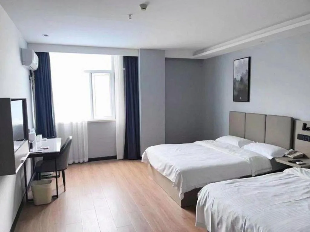 Bed in GreenTree Inn Hefei East Wangjiang Road CTCE Express Hotel