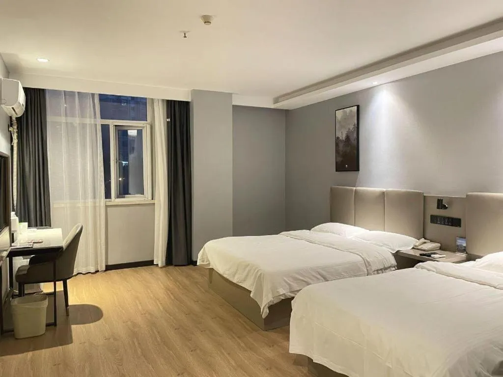 Bed in GreenTree Inn Hefei East Wangjiang Road CTCE Express Hotel