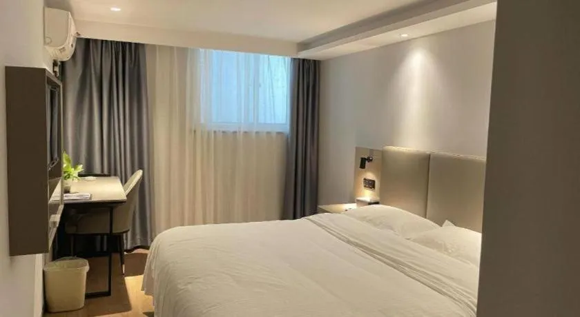 Bed in GreenTree Inn Hefei East Wangjiang Road CTCE Express Hotel