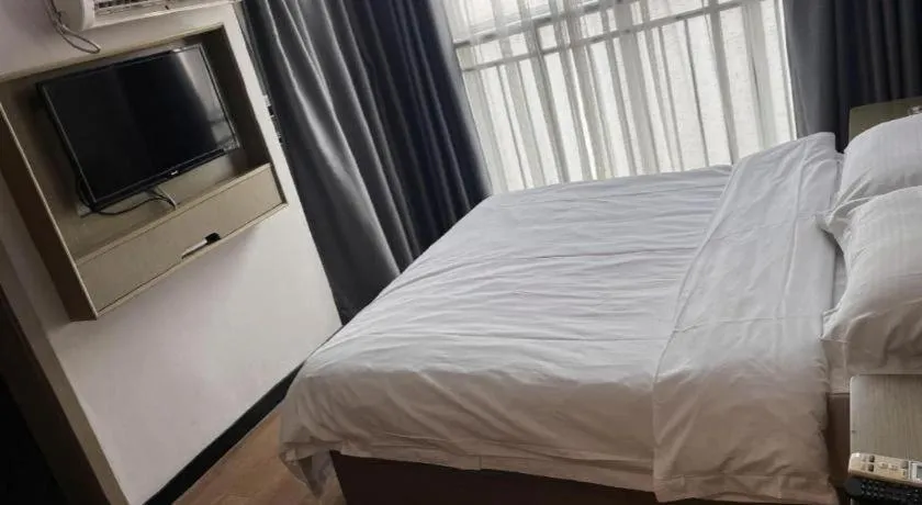 Bed in GreenTree Inn Hefei East Wangjiang Road CTCE Express Hotel