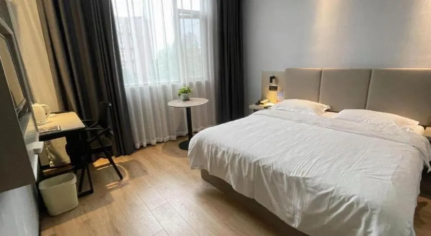 Bed in GreenTree Inn Hefei East Wangjiang Road CTCE Express Hotel