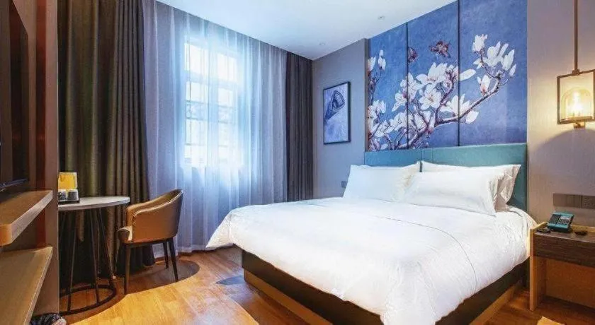 Bed in Jinjiang Inn Wuhan Linjiaohu Wanda Branch