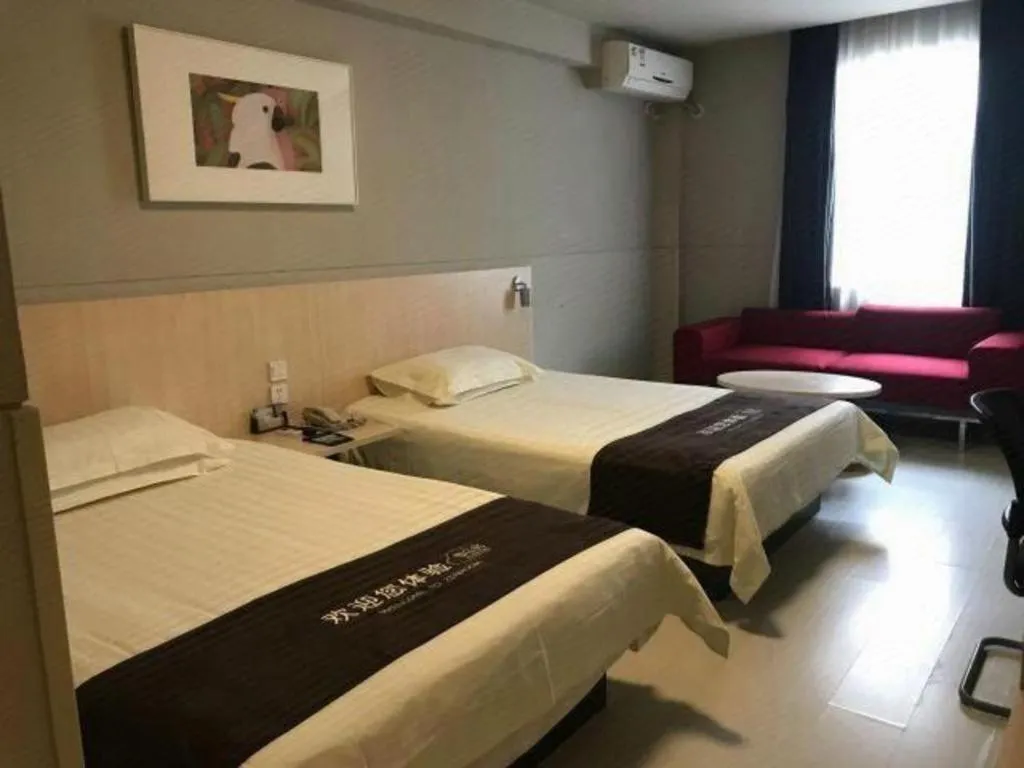 Bed in Jinjiang Inn Wuhan Linjiaohu Wanda Branch