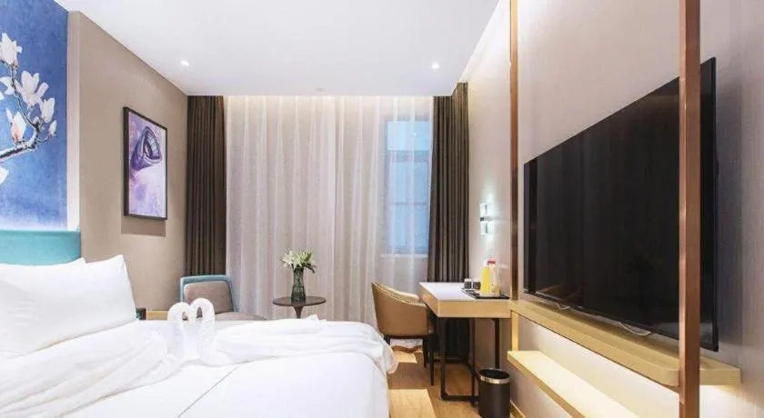 Bed in Jinjiang Inn Wuhan Linjiaohu Wanda Branch