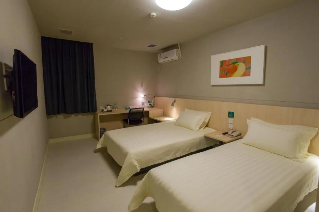 Bed in Jinjiang Inn Wuhan Linjiaohu Wanda Branch