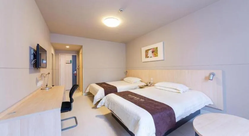 Bed in Jinjiang Inn Wuhan Linjiaohu Wanda Branch