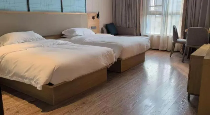 Bed in Echarm Hotel Baise Sports Center Dream Island Plaza