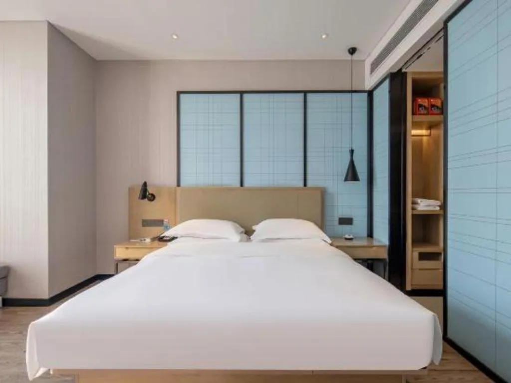 Bed in Echarm Hotel Baise Sports Center Dream Island Plaza