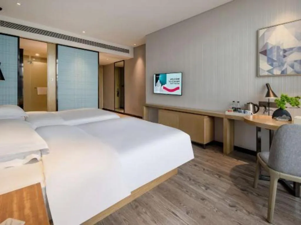 Bed in Echarm Hotel Baise Sports Center Dream Island Plaza