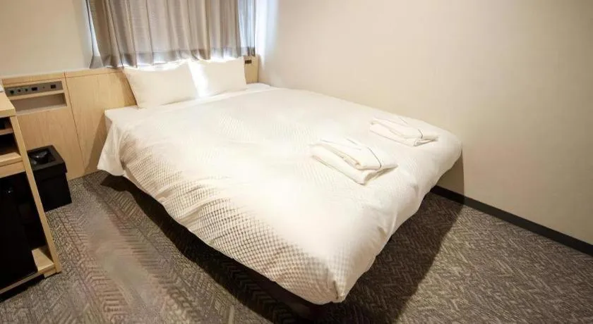 Bed in Hotel IL FIORE Kasai ANNEX
