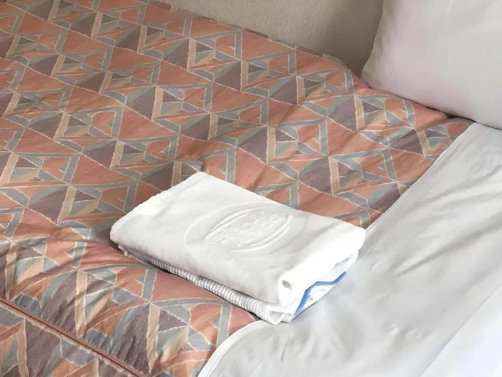 Bed in Hotel IL FIORE Kasai ANNEX