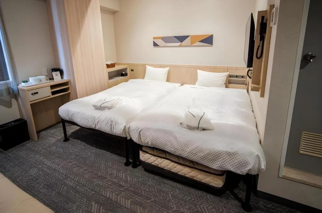 Bed in Hotel IL FIORE Kasai ANNEX