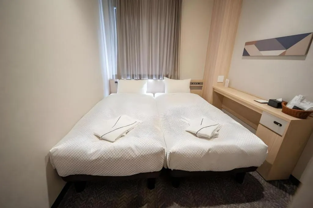 Bed in Hotel IL FIORE Kasai ANNEX