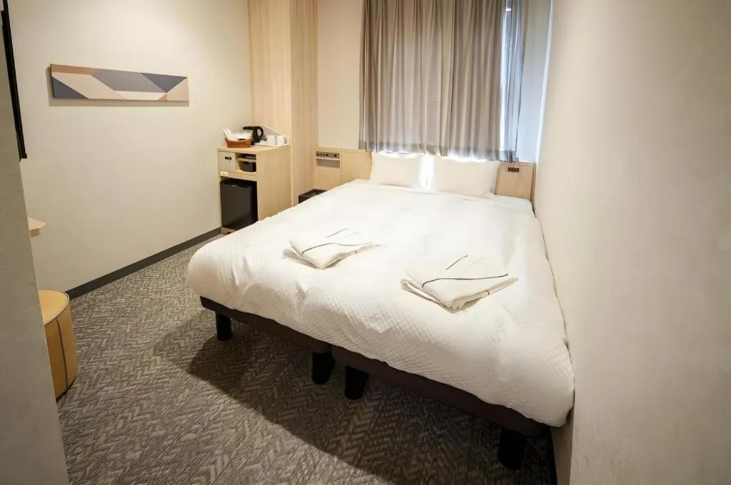 Bed in Hotel IL FIORE Kasai ANNEX