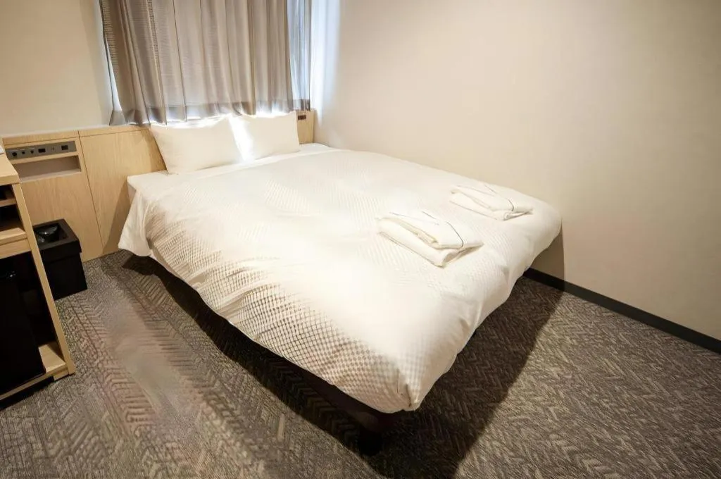 Bed in Hotel IL FIORE Kasai ANNEX