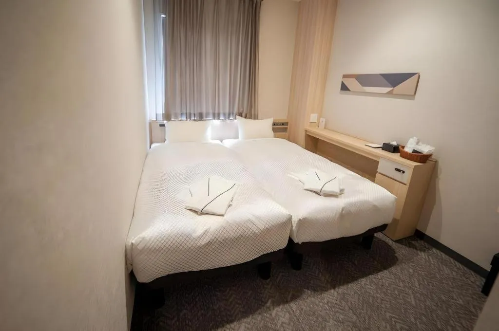 Bed in Hotel IL FIORE Kasai ANNEX